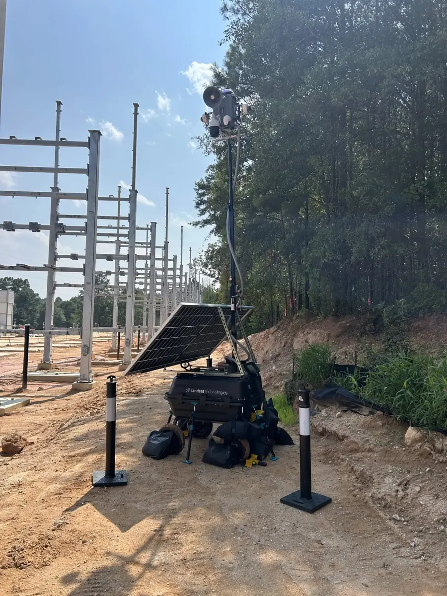 LOBO with its horn speaker and cameras, next to new steel electrical structures.