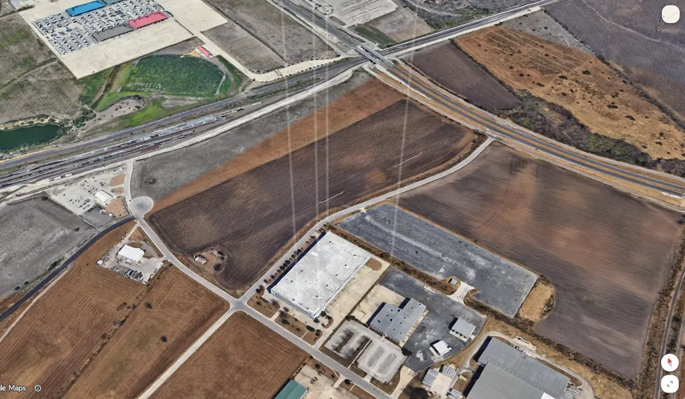 Fleet's 3D map with tower beams over a site.